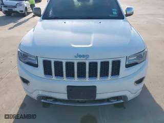 2014 Jeep Grand Cherokee Overland with VIN 1C4RJFCG6EC579985, listed as a IAAI auction lot 42025215 with 126,761 mi miles. Bid and sale history available at carsss.com. Image 13.