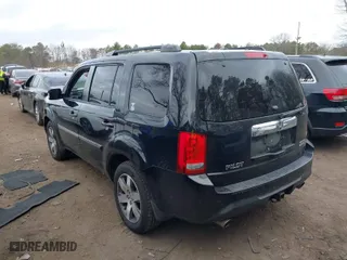 2013 Honda Pilot Touring with VIN 5FNYF4H9XDB045255, listed as a IAAI auction lot 42012812 with 209,956 mi miles. Bid and sale history available at carsss.com. Image 3.