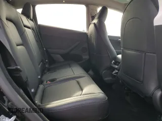2025 Tesla Model Y Long Range z VIN 7SAYGDEE7SF288570, wystawiony jako Copart lot #48596345 z przebiegiem 4 366 mil mil oraz Szkoda całkowita • Salvage title. Historia ofert i sprzedaży dostępna na DreamBid. Obrazek 10.