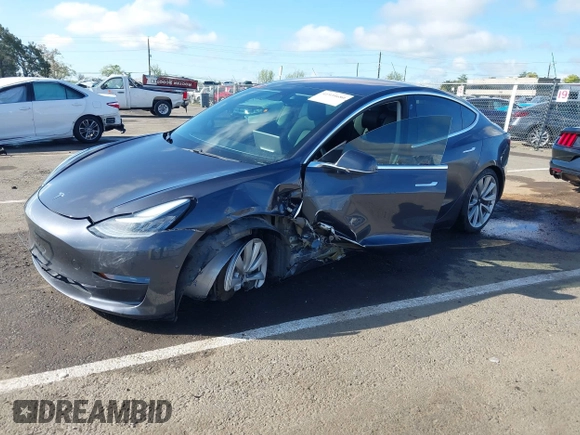 2018 Tesla Model 3 Long Range Battery with VIN 5YJ3E1EA4JF006036, listed as a IAAI auction lot 41934680 with 115,649 mi miles and . Bid and sale history available at DreamBid. Image 16.