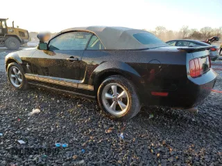 2008 Ford Mustang Deluxe with VIN 1ZVHT84N985180475, listed as a Copart auction lot 87002774 with 124,015 mi miles and Salvage Title. Bid and sale history available at carsss.com. Image 2.