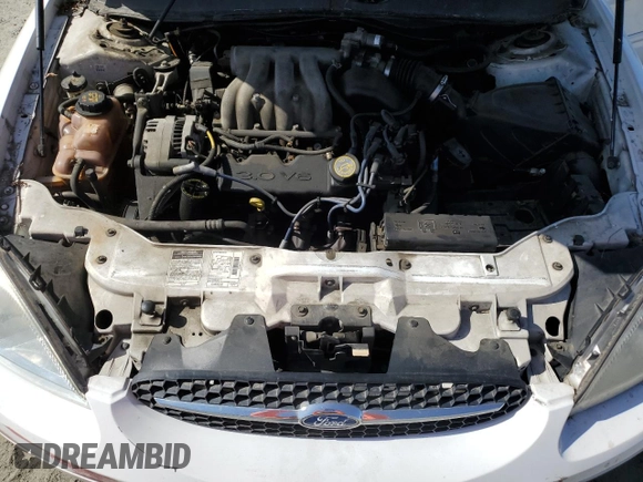 2000 Ford Taurus LX with VIN 1FAFP5222YA168638, listed as a Copart auction lot 60710415 with 119,948 mi miles and Salvage title. Bid and sale history available at DreamBid. Image 11.
