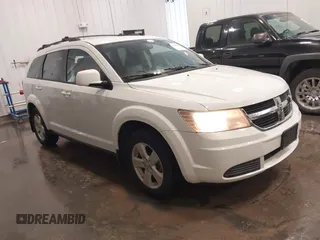 2009 Dodge Journey SXT z VIN 3D4GG57V09T582922, wystawiony jako IAAI lot #42248003 z przebiegiem 138 059 mil mil oraz . Historia ofert i sprzedaży dostępna na DreamBid. Obrazek 1.