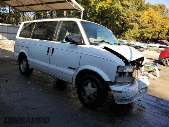 2000 Chevrolet Astro with VIN 1GNDM19W8YB158337, listed as a Copart auction lot 77418574 with Not Provided miles and Salvage Title. Bid and sale history available at carsss.com. Image 4.