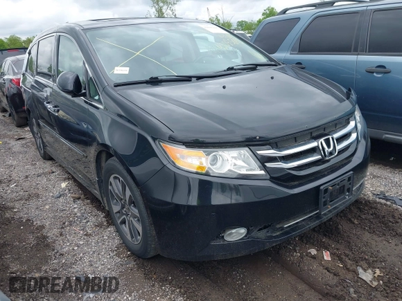 2014 Honda Odyssey Touring with VIN 5FNRL5H94EB079518, listed as a IAAI auction lot 42095098 with 141,019 mi miles and . Bid and sale history available at DreamBid. Image 1.