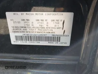 2006 Mazda 3 s with VIN JM1BK324061409297, listed as a IAAI auction lot 40561857 with 117,266 mi miles and . Bid and sale history available at DreamBid. Image 9.