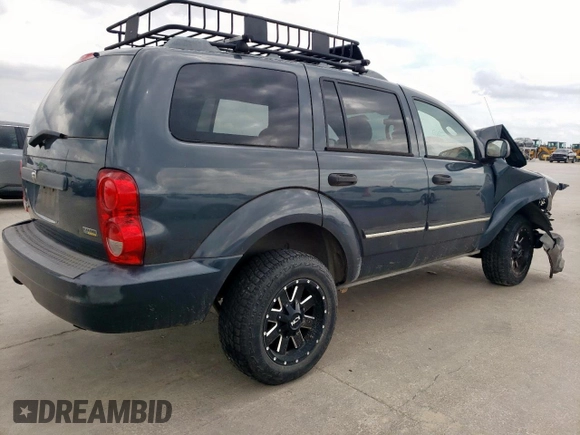 2007 Dodge Durango SLT z VIN 1D8HD48P87F581689, wystawiony jako Copart lot #54937005 z przebiegiem Nie podano mil oraz Szkoda całkowita • Salvage title. Historia ofert i sprzedaży dostępna na DreamBid. Obrazek 3.