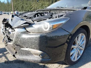 2017 Mazda 3 Grand Touring with VIN JM1BN1W38H1137226, listed as a IAAI auction lot 42034889 with 79,489 mi miles and . Bid and sale history available at DreamBid. Image 17.