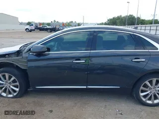 2013 Cadillac XTS Luxury with VIN 2G61P5S34D9103182, listed as a IAAI auction lot 40184614 with 183,014 mi miles. Bid and sale history available at carsss.com. Image 15.