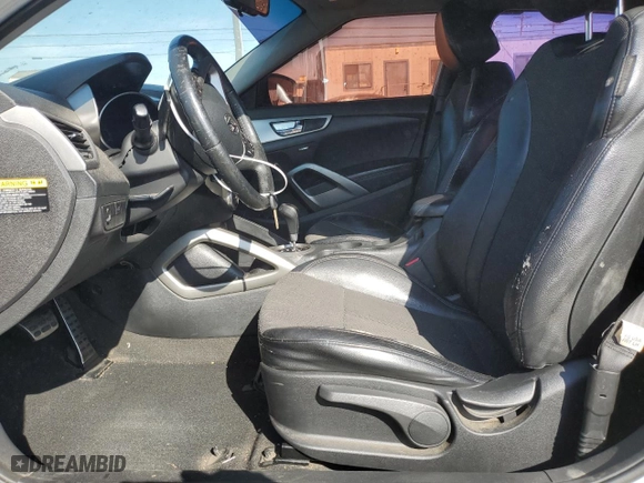 2013 Hyundai Veloster w/Black Int with VIN KMHTC6AD0DU088518, listed as a Copart auction lot 50732385 with 130,395 mi miles and Clean Title. Bid and sale history available at carsss.com. Image 7.