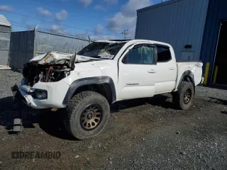 2020 Toyota Tacoma SR5 z VIN 5TFCZ5AN5LX238688, wystawiony jako Copart lot #52902765 z przebiegiem 96 407 mil mil oraz Szkoda całkowita • Salvage title. Historia ofert i sprzedaży dostępna na DreamBid. Obrazek 1.