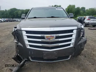 2020 Cadillac Escalade Luxury with VIN 1GYS4BKJ2LR101971, listed as a Copart auction lot 58312245 with 58,069 mi miles and Salvage title. Bid and sale history available at DreamBid. Image 5.
