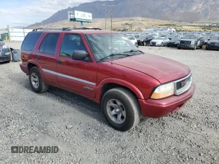 2000 GMC Jimmy SLE Convenience with VIN 1GKDT13W0Y2292445, listed as a Copart auction lot 77914514 with 220,291 mi miles and Salvage Title. Bid and sale history available at carsss.com. Image 4.