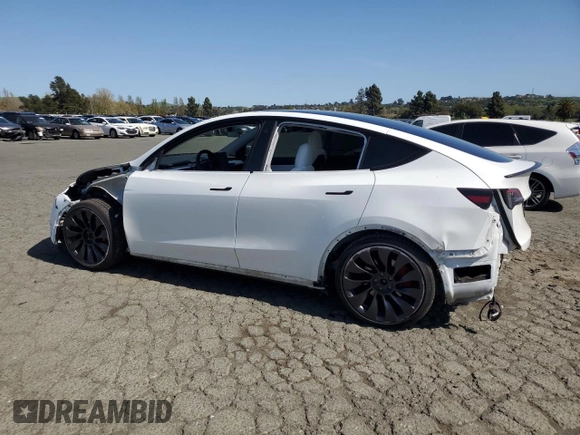 2021 Tesla Model Y Performance z VIN 5YJYGDEF2MF277467, wystawiony jako Copart lot #52410275 z przebiegiem 57 116 mil mil oraz Szkoda całkowita • Salvage title. Historia ofert i sprzedaży dostępna na DreamBid. Obrazek 2.