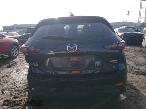 2022 Mazda CX-5 2.5 Turbo with VIN JM3KFBAY5N0647340, listed as a Copart auction lot 85123474 with 68,510 mi miles and Salvage Title. Bid and sale history available at carsss.com. Image 6.