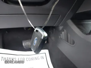 2021 Ford Edge Titanium with VIN 2FMPK4K96MBA18546, listed as a IAAI auction lot 42584326 with 65,214 mi miles and . Bid and sale history available at DreamBid. Image 11.