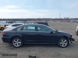 2012 Volkswagen Passat SE with VIN 1VWBP7A37CC021336, listed as a IAAI auction lot 41724459 with 124,832 mi miles. Bid and sale history available at carsss.com. Image 12.