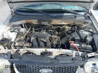 2002 Ford Escape XLT Choice with VIN 1FMYU03102KB44453, listed as a IAAI auction lot 41951739 with 331,792 mi miles and . Bid and sale history available at DreamBid. Image 10.