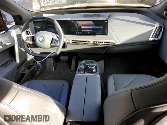 2022 BMW iX xDrive50 with VIN WB523CF05NCK56452, listed as a Copart auction lot 82352873 with 28,965 mi miles. Bid and sale history available at carsss.com. Image 8.