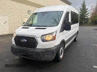 2021 Ford Transit Passenger XL with VIN 1FDAX2C80MKA72528, listed as a Copart auction lot 86920734 with 22,456 mi miles and Salvage Title. Bid and sale history available at DreamBid. Image 2.