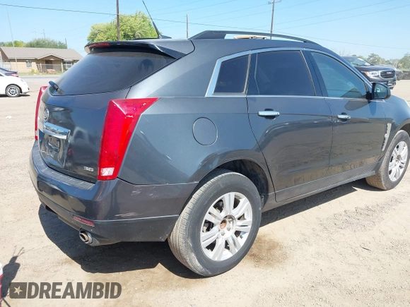 2012 Cadillac SRX with VIN 3GYFNGE32CS546815, listed as a IAAI auction lot 42014765 with 142,373 mi miles. Bid and sale history available at carsss.com. Image 4.
