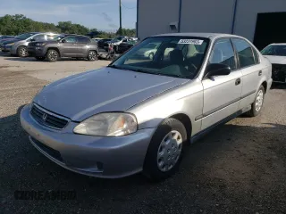1999 Honda Civic LX with VIN 2HGEJ6678XH560446, listed as a Copart auction lot 56669794 with 197,100 mi miles and Non Repairable. Bid and sale history available at carsss.com. Image 1.