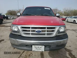 2001 Ford F-150 XLT z VIN 1FTRW07L41KF97200, wystawiony jako Copart lot #51093245 z przebiegiem 227 310 mil mil oraz Szkoda całkowita • Salvage title. Historia ofert i sprzedaży dostępna na DreamBid. Obrazek 5.