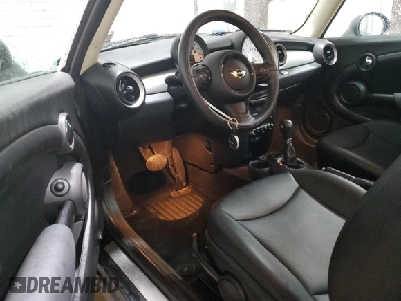 2012 MINI Hardtop with VIN WMWSU3C55CT541969, listed as a Copart auction lot 60988325 with 44,770 mi miles and Salvage title. Bid and sale history available at DreamBid. Image 8.