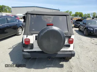 2005 Jeep Wrangler X with VIN 1J4FA39S75P332586, listed as a Copart auction lot 53334725 with 96,728 mi miles and Salvage title. Bid and sale history available at DreamBid. Image 6.