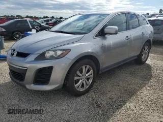 2010 Mazda CX-7 Touring with VIN JM3ER2W38A0351935, listed as a Copart auction lot 74213024 with 107,027 mi miles and Salvage Title. Bid and sale history available at carsss.com. Image 1.