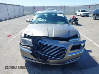 2014 Chrysler 300 z VIN 2C3CCAAGXEH335800, wystawiony jako IAAI lot #41984427 z przebiegiem 247 358 mil mil oraz . Historia ofert i sprzedaży dostępna na DreamBid. Obrazek 12.