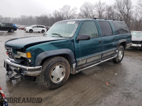 1995 GMC Suburban z VIN 1GKFK16K0SJ748087, wystawiony jako Copart lot #85121834 z przebiegiem 191 550 mil mil oraz Szkoda całkowita • Salvage title. Historia ofert i sprzedaży dostępna na DreamBid. Obrazek 1.
