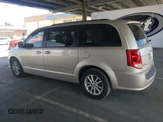2014 Dodge Grand Caravan SXT with VIN 2C4RDGCG6ER427418, listed as a Copart auction lot 55841215 with 154,524 mi miles and Clean Title. Bid and sale history available at DreamBid. Image 2.