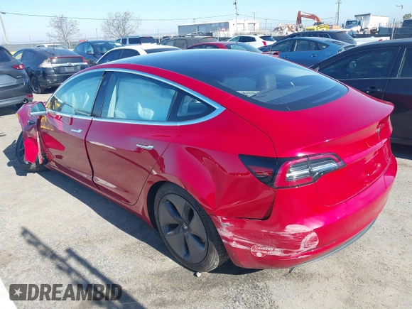 2018 Tesla Model 3 Long Range Battery z VIN 5YJ3E1EA4JF022284, wystawiony jako IAAI lot #41422203 z przebiegiem 71 521 mil mil oraz . Historia ofert i sprzedaży dostępna na DreamBid. Obrazek 3.