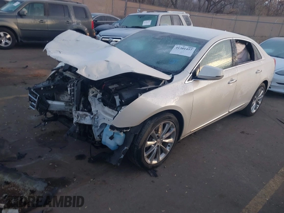 2014 Cadillac XTS Premium with VIN 2G61P5S30E9123057, listed as a IAAI auction lot 41301457 with 123,042 mi miles and . Bid and sale history available at DreamBid. Image 2.
