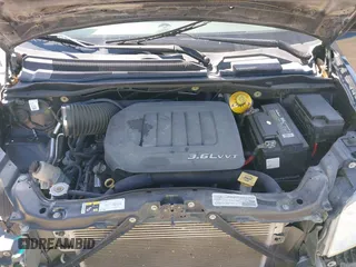 2016 Dodge Grand Caravan SXT with VIN 2C4RDGCG0GR387856, listed as a IAAI auction lot 41769163 with 103,856 mi miles and . Bid and sale history available at DreamBid. Image 10.