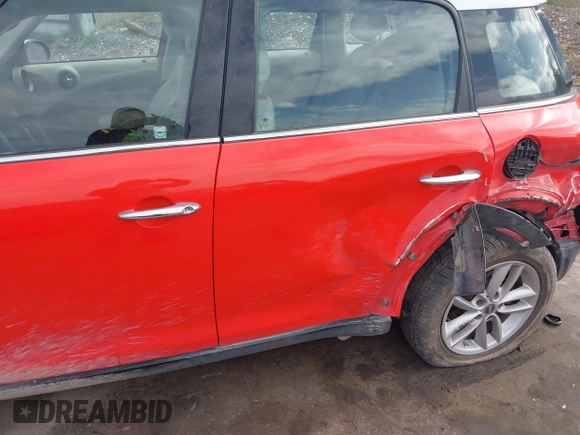 2012 MINI Countryman S with VIN WMWZC5C54CWM13041, listed as a IAAI auction lot 42244303 with 139,733 mi miles and . Bid and sale history available at DreamBid. Image 6.