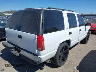1999 Chevrolet Tahoe z VIN 1GNEC13R3XJ415502, wystawiony jako IAAI lot #41841169 z przebiegiem 223 687 mil mil oraz . Historia ofert i sprzedaży dostępna na DreamBid. Obrazek 4.