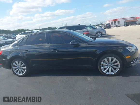 2017 Audi A4 Premium z VIN WAUGNAF42HN008791, wystawiony jako IAAI lot #42206696 z przebiegiem 101 527 mil mil oraz . Historia ofert i sprzedaży dostępna na DreamBid. Obrazek 13.