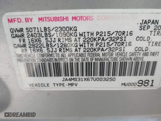 2007 Mitsubishi Outlander ES with VIN JA4MS31X67U003250, listed as a IAAI auction lot 41429499 with 134,016 mi miles. Bid and sale history available at carsss.com. Image 9.