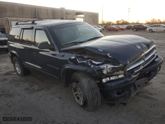 2001 Dodge Durango with VIN 1B4HS28Z21F637575, listed as a Copart auction lot 83012674 with 276,619 mi miles and Salvage Title. Bid and sale history available at carsss.com. Image 4.