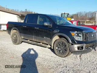 2017 Nissan Titan SV with VIN 1N6AA1E57HN516363, listed as a IAAI auction lot 41780611 with 114,749 mi miles and . Bid and sale history available at DreamBid. Image 1.