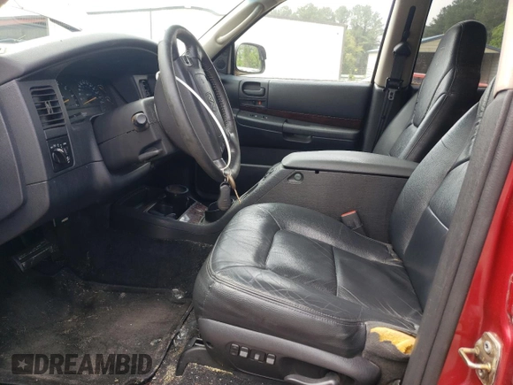 2001 Dodge Durango z VIN 1B4HS28N91F507032, wystawiony jako Copart lot #57110765 z przebiegiem 103 105 mil mil oraz Czysty tytuł • Clean title. Historia ofert i sprzedaży dostępna na DreamBid. Obrazek 7.