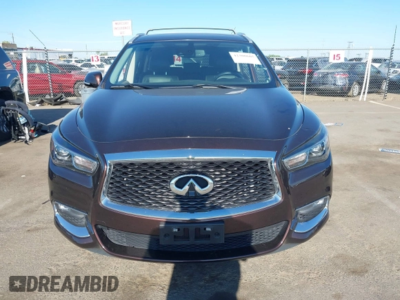 2019 Infiniti QX60 Pure with VIN 5N1DL0MM4KC569307, listed as a IAAI auction lot 42300605 with 40,336 mi miles and . Bid and sale history available at DreamBid. Image 13.