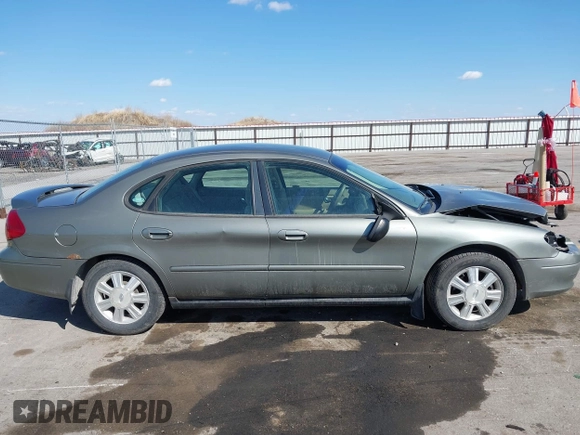 2003 Ford Taurus SES Standard with VIN 1FAFP55283G168564, listed as a IAAI auction lot 41884130 with 199,923 mi miles and . Bid and sale history available at DreamBid. Image 13.