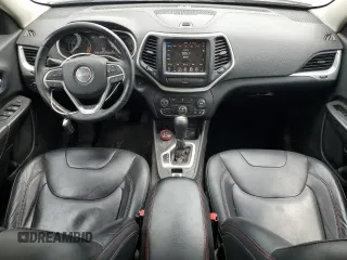 2014 Jeep Cherokee Trailhawk z VIN 1C4PJMBS9EW159721, wystawiony jako Copart lot #60719525 z przebiegiem 136 807 mil mil oraz Szkoda całkowita • Salvage title. Historia ofert i sprzedaży dostępna na DreamBid. Obrazek 8.