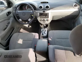 2006 Suzuki Forenza z VIN KL5JD86Z86K256922, wystawiony jako Copart lot #42201125 z przebiegiem 39 043 mil mil oraz Tytuł czysty. Historia ofert i sprzedaży dostępna na DreamBid. Obrazek 8.
