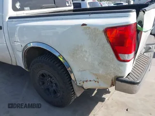2004 Nissan Titan LE with VIN 1N6AA07A34N570788, listed as a IAAI auction lot 41823592 with 228,344 mi miles and . Bid and sale history available at DreamBid. Image 6.