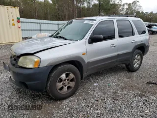 2003 Mazda Tribute LX with VIN 4F2YZ04153KM20941, listed as a Copart auction lot 82683264 with 195,240 mi miles and Salvage Title. Bid and sale history available at DreamBid. Image 1.