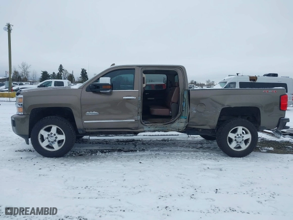 2015 Chevrolet Silverado 2500HD Built After Aug 14 High Country with VIN 1GC1KXE89FF543780, listed as a IAAI auction lot 41557608 with 164,171 mi miles. Bid and sale history available at carsss.com. Image 15.
